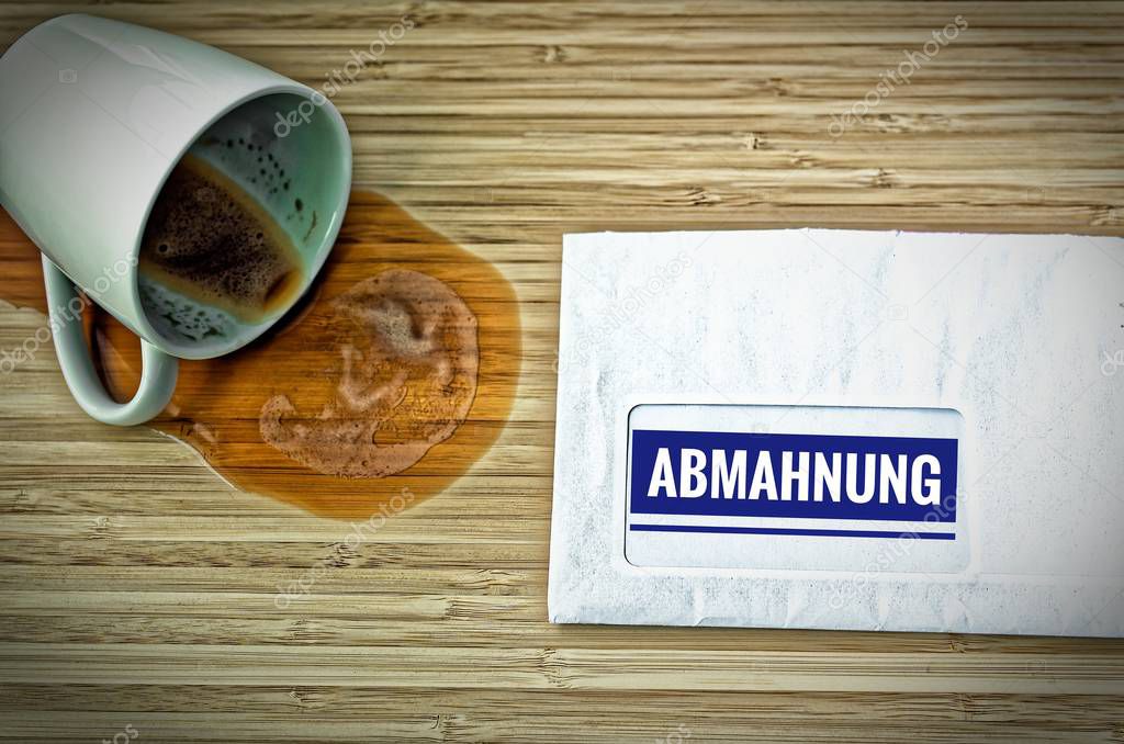 Letter with in german Achtung Abmahnung in english attention warning