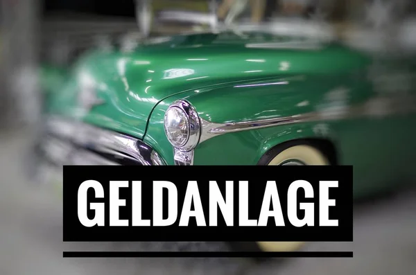 American vintage car in green with inscription in german Geldanlage in english financial investment