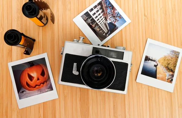 Instant Camera White Exposed Instant Films Drotty Headphones Bamboo Table — Stock Photo, Image