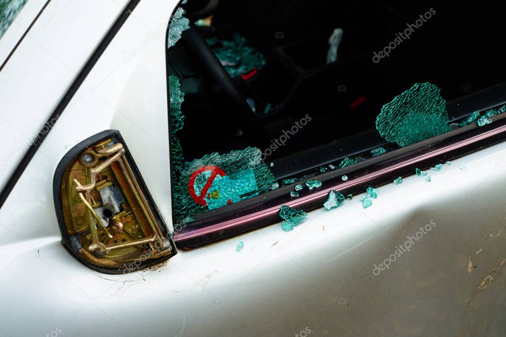 Car in which the disc was hit and all internal parts were stolen with broken glass and broken disc