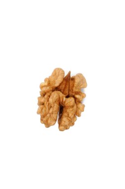 Beyaz zemin üzerinde bir ceviz çekirdek. Yukarıdan görüntülemek.