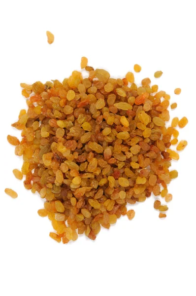 Beyaz zemin üzerine altın kuru üzüm. Yukarıdan görüntülemek.