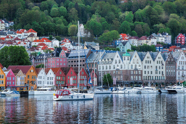 Bryggen street with boats in Bergen, UNESCO World Heritage Site, Norway