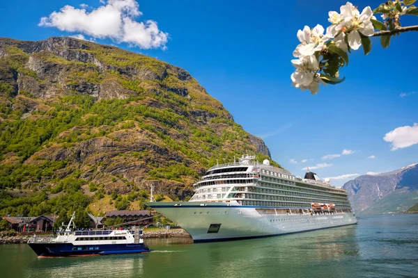 Flam village with ship in harbor against fjord during spring time, Norway — Stock Photo, Image