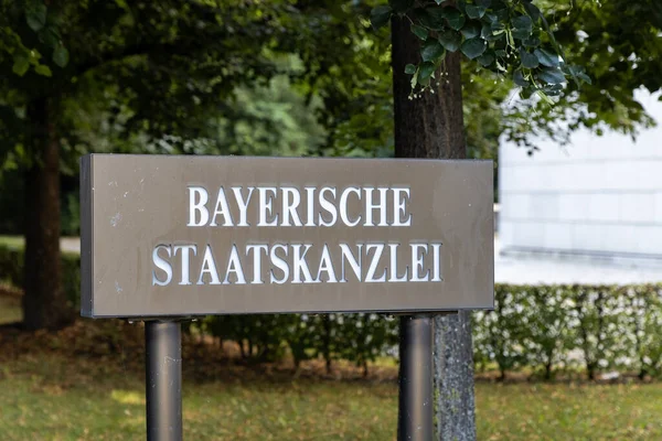 Sign of the state chancellery (Text: Bayerische Staatskanzlei means bavarian state chancellerey) at hofgarten in munich/germany
