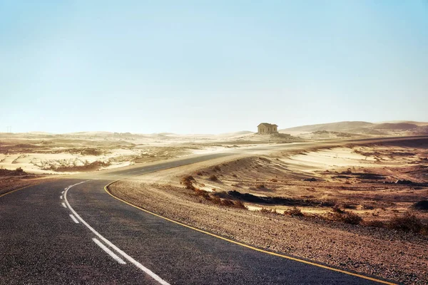 Sand Storm Across Lonely Desert Road in Southern Namibia taken in January 2018