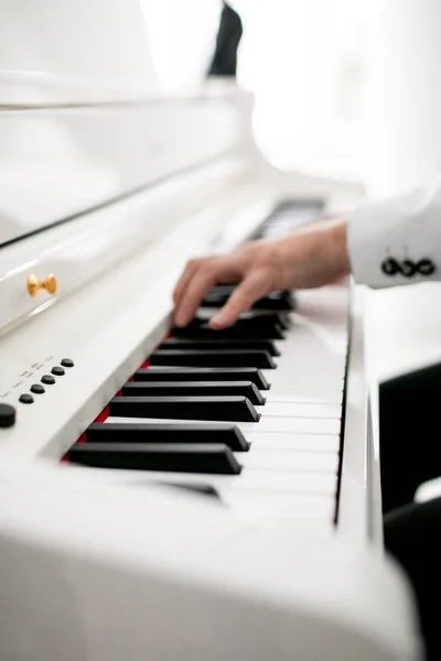 Close up of man hands piano playing. Male pianist hands on grand piano keyboard — Stock Photo, Image