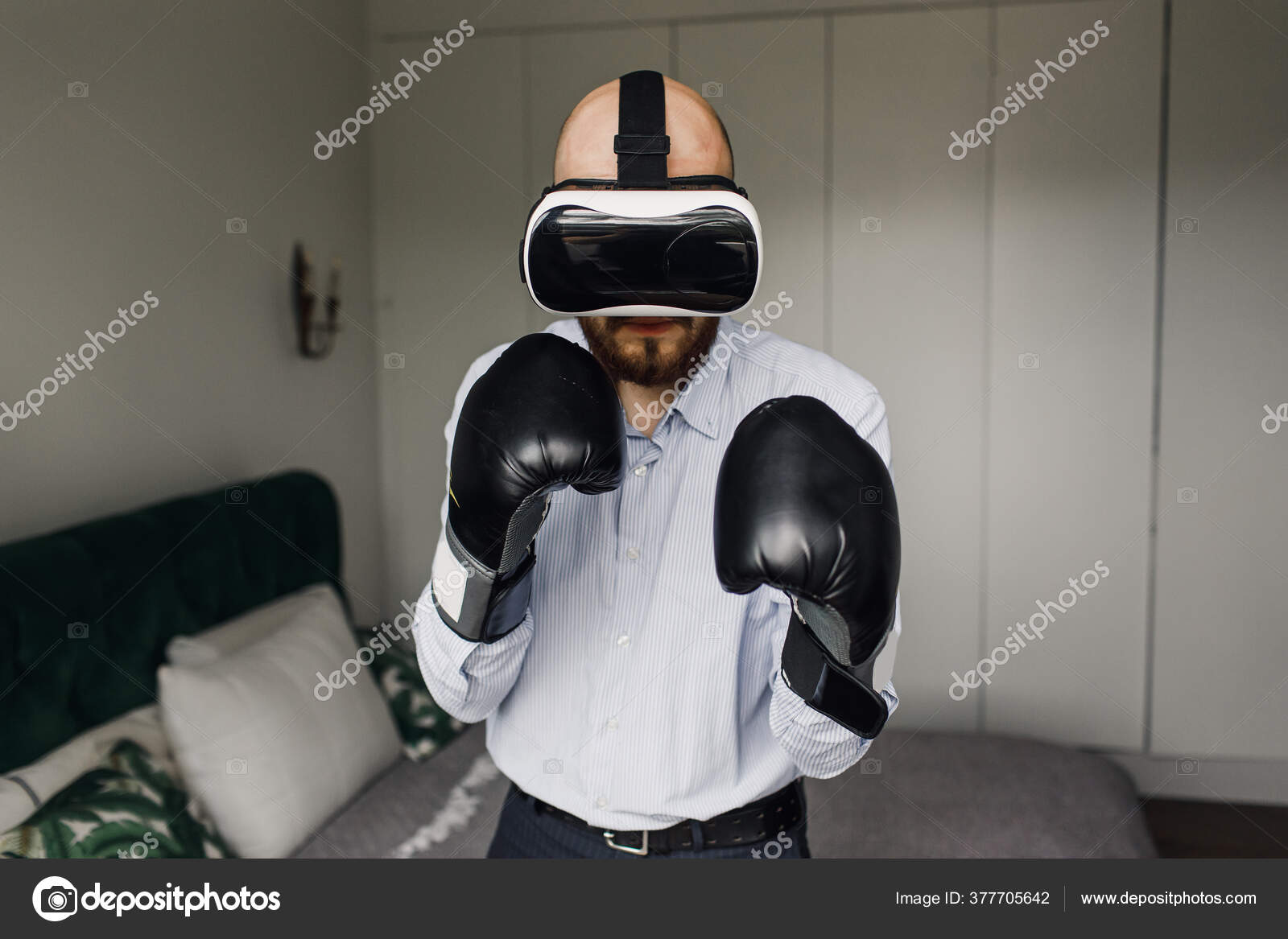Augmented 3D world. Cyber sportsman boxing gloves. Man play game in VR glasses. Cyber sport concept. Man boxer virtual reality headset simulation