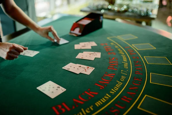 the dealer distributes chips in the casino