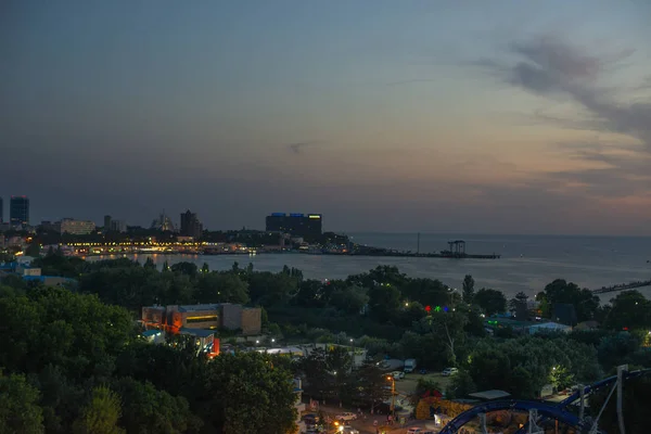 Beautiful view of coastal city Anapa with river flowing into the sea on the sunset. — Stock Photo, Image