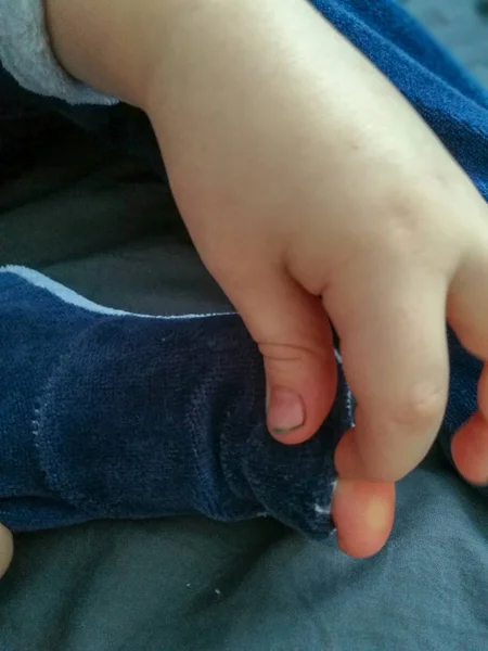 Small Child Touches Big Toe Which Came Out Hole Sock — Stock Photo, Image