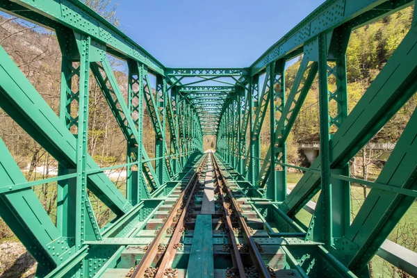 green color train bridge center