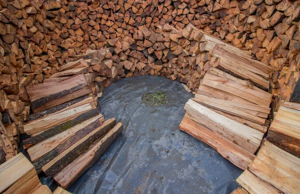 inside layer of round wood pile