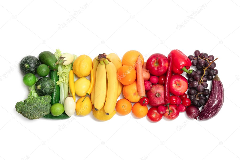 Rainbow composition with fresh vegetables and fruits on white background, flat lay