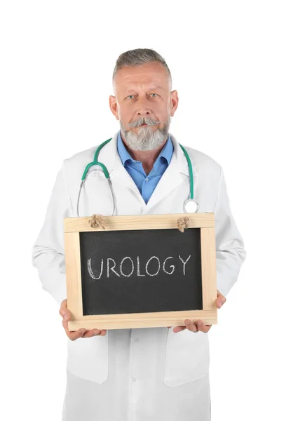 Male Doctor Holding Chalkboard Word Urology White Background — Stock Photo, Image