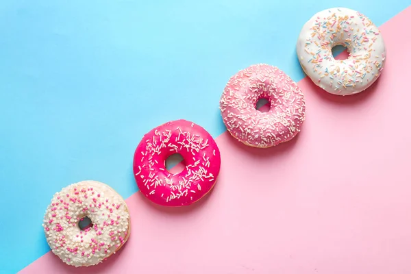 Delicious Doughnuts Sprinkles Color Background Top View — Stock Photo, Image