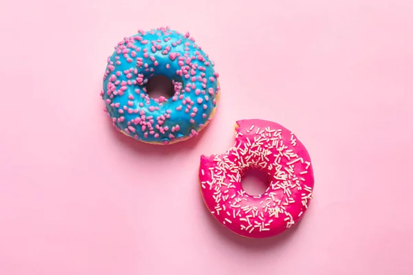 Delicious Glazed Doughnuts Color Background Top View — Stock Photo, Image