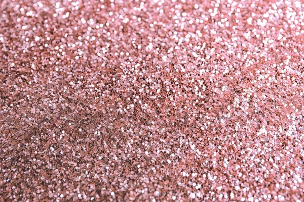 Texture of rose glitter fabric as background