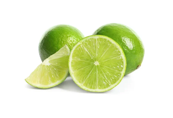 Färska Mogna Gröna Limefrukter Vit Bakgrund — Stockfoto