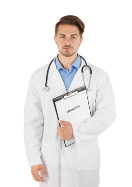 Pano ile kelime Üroloji beyaz arka planda tutan erkek doktor