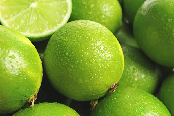 Verse Rijpe Groene Limoenen Als Achtergrond — Stockfoto