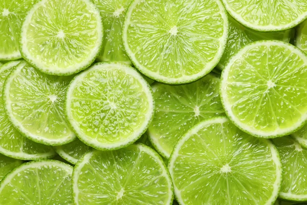 Świeżo Krojone Dojrzałe Limes Jako Tło Widok Góry — Zdjęcie stockowe