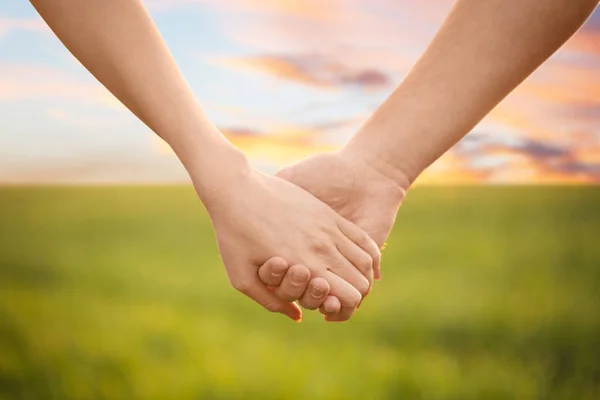 Young Lovely Couple Holding Hands Green Field Closeup — Stock Photo, Image