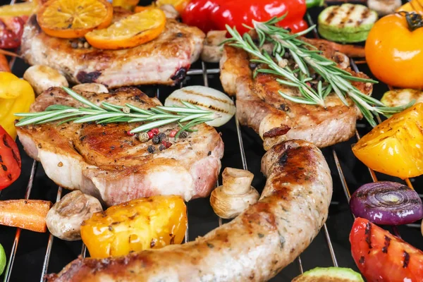 Modern barbecue grill with tasty food, closeup