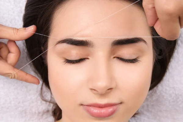 Young Woman Having Professional Eyebrow Correction Procedure Beauty Salon Closeup — Stock Photo, Image
