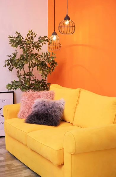Elegant living room interior with yellow sofa
