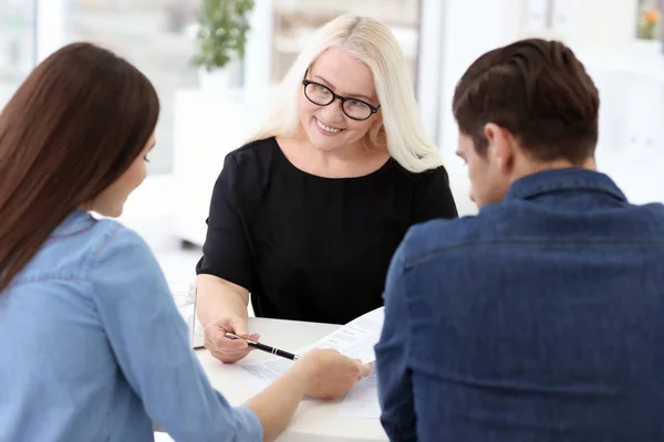 Young Couple Discussing Pension Plan Mature Consultant Office — Stock Photo, Image