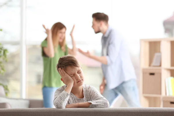 Little Unhappy Boy Sitting Sofa While Parents Arguing Home — Stock Photo, Image