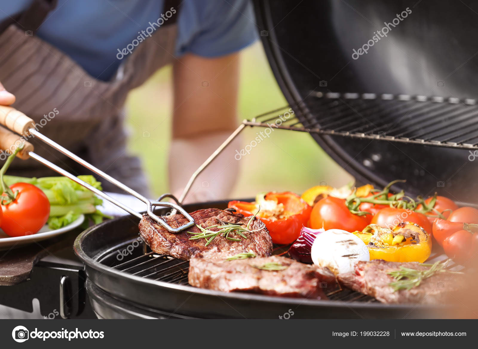 Man Cooking Meat Vegetables Barbecue Grill Outdoors Stock Photo by