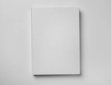Mockup ciltli kitap beyaz arka plan, üstten görünüm