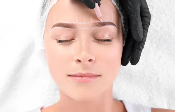Young Woman Undergoing Eyebrow Correction Procedure Salon Top View — Stock Photo, Image