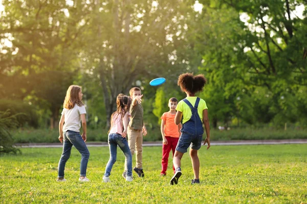 Cute Little Children Playing Frisbee Outdoors Sunny Day Stock Picture