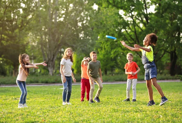 Cute Little Children Playing Frisbee Outdoors Sunny Day Royalty Free Stock Photos