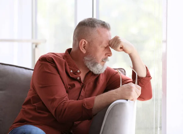 Depressed Senior Man Sitting Armchair Indoors — Stock Photo, Image