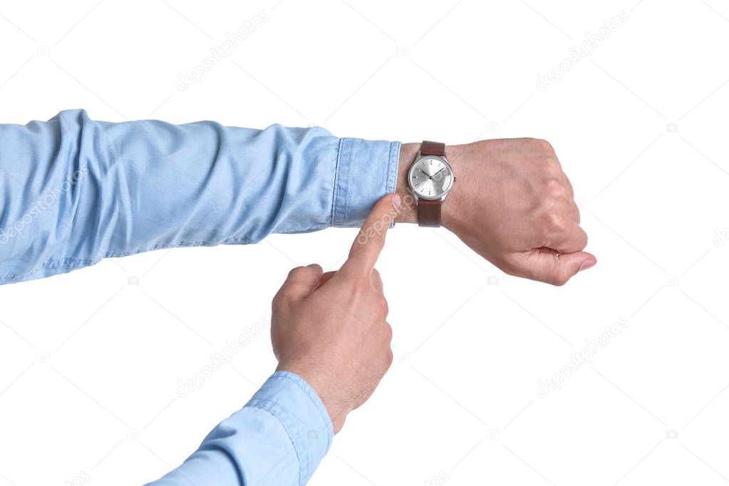 Young man with wristwatch on white background. Time concept