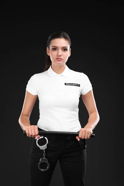 Female Security Guard Police Baton Dark Background — Stock Photo, Image