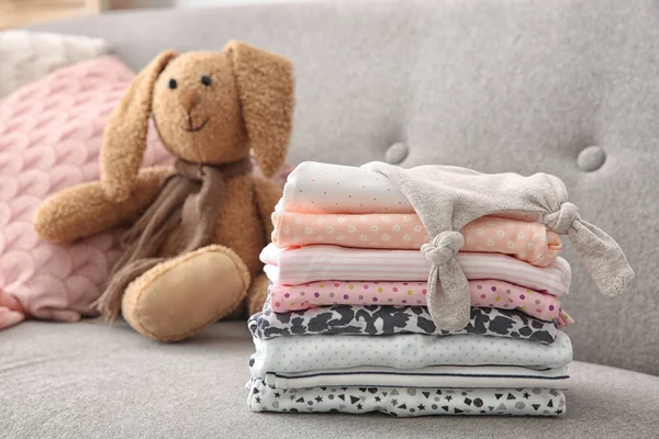 Toy Bunny Stack Stylish Child Clothes Sofa — Stock Photo, Image