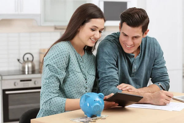 Young Couple Discussing Pension Plan Home Stock Image