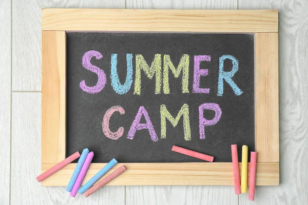Blackboard Text Summer Camp Chalked Different Colors Wooden Background Top — Stock Photo, Image