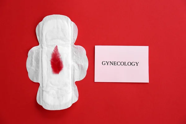Flat Lay Composition Menstrual Pad Red Feather Color Background Gynecological — Stock Photo, Image