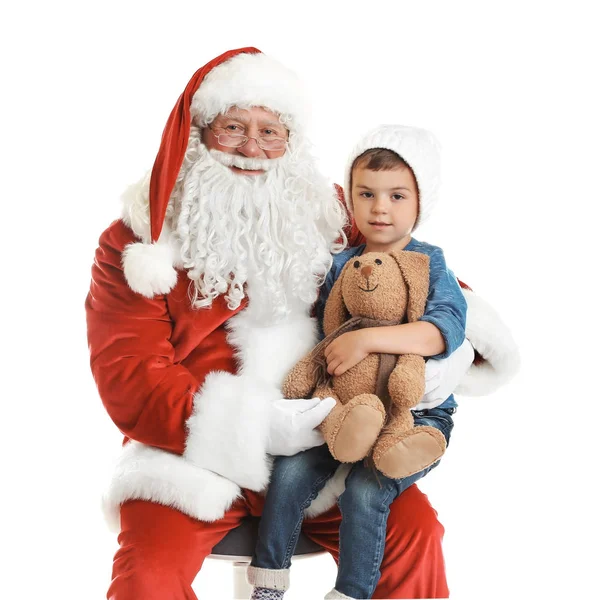 Beyaz arka plan karşı otantik Noel baba nın kucağına oturmuş oyuncak tavşan ile küçük çocuk