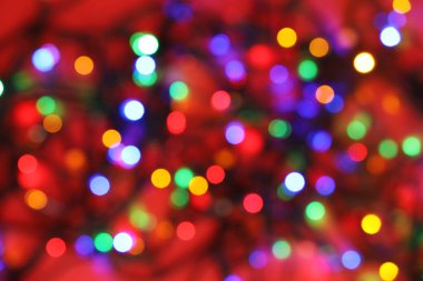 Parlak Noel ışıkları bulanık görünüm renk arka plan, üstten görünüm