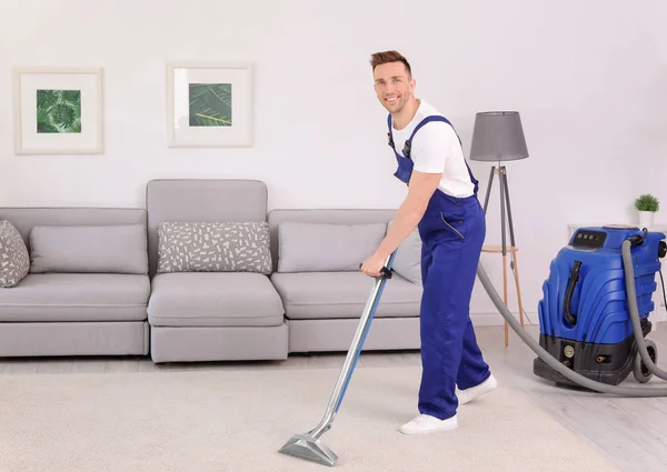 Male Worker Removing Dirt Carpet Professional Vacuum Cleaner Indoors — Stock Photo, Image