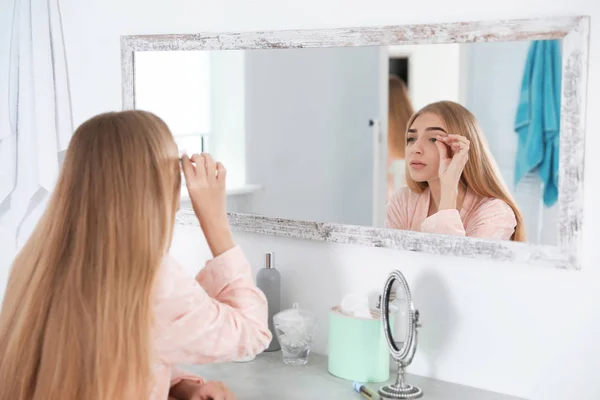 Young Woman Eyelash Loss Problem Looking Mirror Indoors — Stock Photo, Image