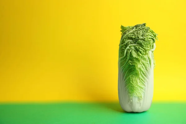 Fresh ripe cabbage on color background