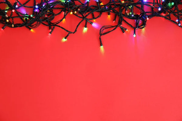 Glowing Christmas Lights Color Background Top View — Stock Photo, Image